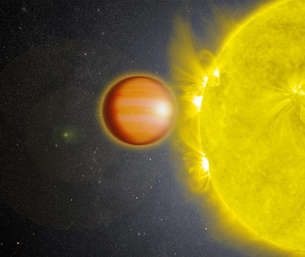 WASP-18b é um exoplaneta localizado a 325 anos-luz da Terra. A massa do planeta é 10 vezes a de Júpiter, e ele orbita sua estrela a cada 23 horas. Um estudo de 2017 revelou que este planeta possui uma estratosfera rica em dióxido de carbono, mas sem sinais de água. A estratosfera é uma camada da atmosfera em que a temperatura aumenta com a altitude. O estudo utilizou os telescópios espaciais Spitzer e Hubble da NASA. Conceito artístico (Artist’s Concept). Crédito da imagem: NASA/JPL – PIA22087