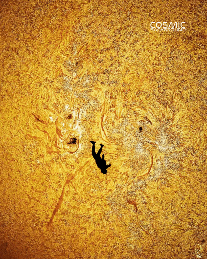 Silhueta do paraquedista em contraste com o Sol, revelando com clareza as manchas solares
Image credit: Andrew McCarthy / cosmicbackground.io