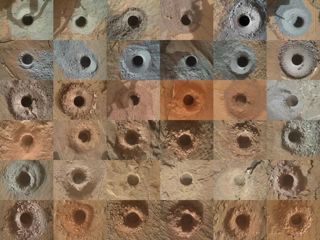 Grade composta por 36 fotografias em close dos buracos de perfuração feitos pelo rover Curiosity em Marte. Cada quadrado mostra uma cavidade circular escavada na superfície rochosa marciana, variando em textura e tonalidade. As imagens são registradas pela câmera MAHLI, localizada no braço robótico do rover.