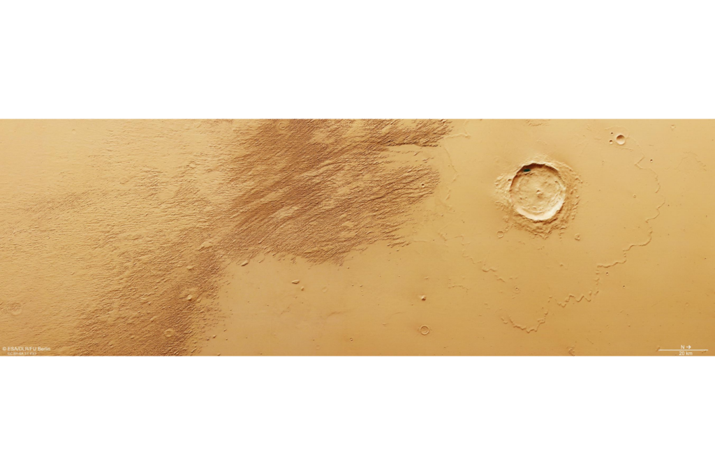 Yardangs esculpidos por ventos carregados de areia na regi&atilde;o de Eumenides Dorsum, pr&oacute;ximos ao equador de Marte, observados pela sonda Mars Express.