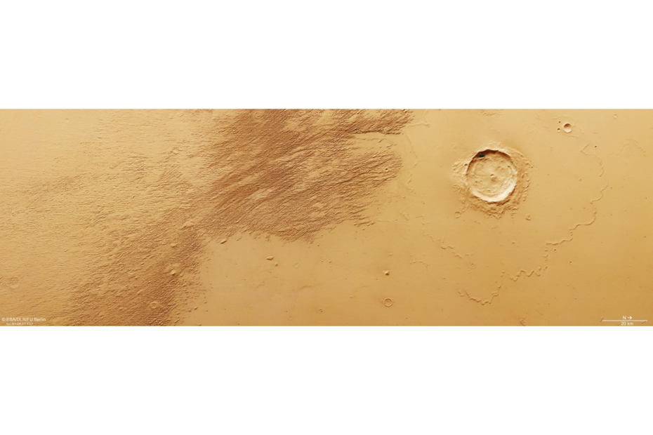 Yardangs esculpidos por ventos carregados de areia na região de Eumenides Dorsum, próximos ao equador de Marte, observados pela sonda Mars Express.