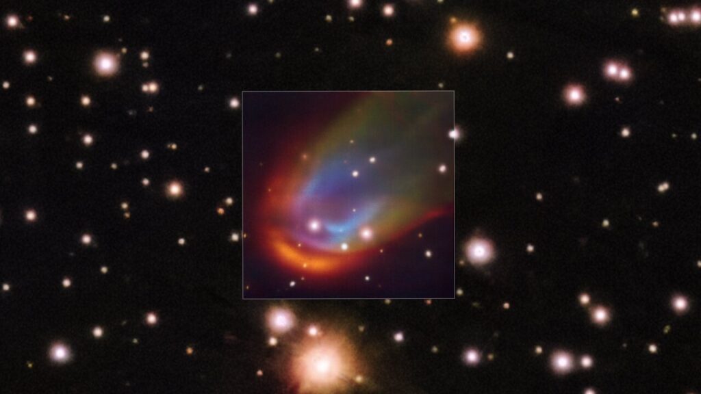 Imagem do Very Large Telescope mostra uma estrela morta atravessando o espa&ccedil;o e gerando uma onda de choque curva no meio interestelar, vis&iacute;vel como um arco luminoso &agrave; sua frente.